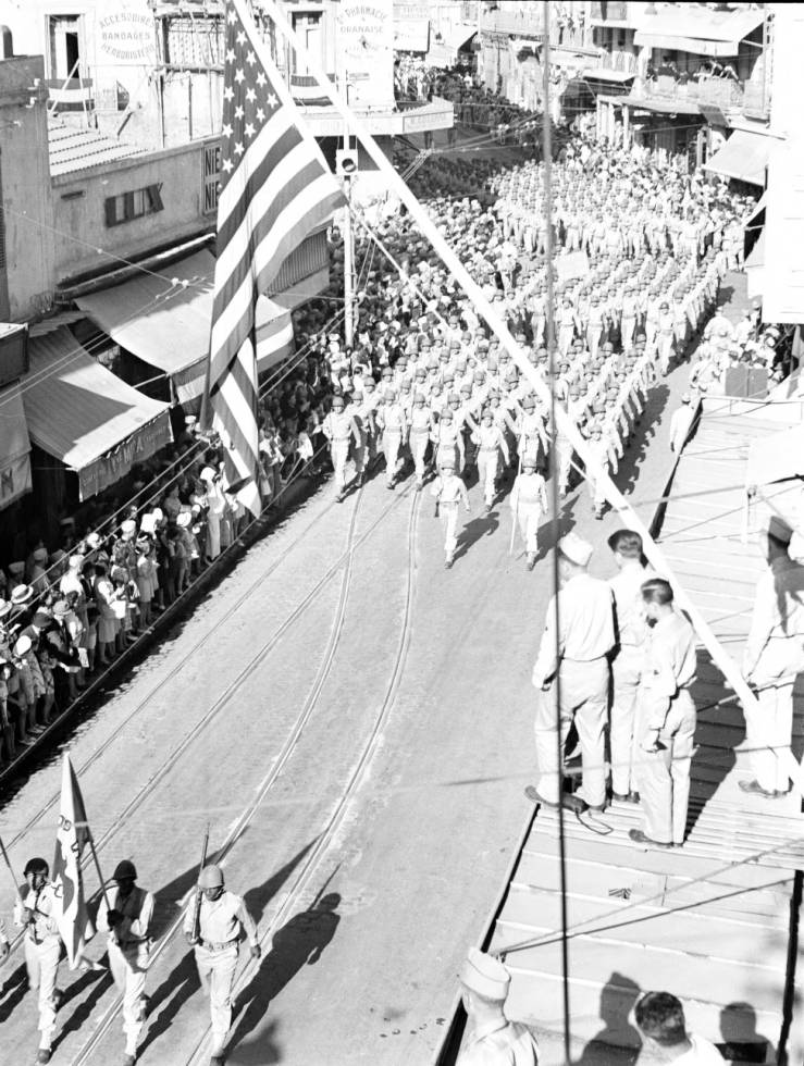 Algeria_troops_marching_through_Oran_street_in_parade